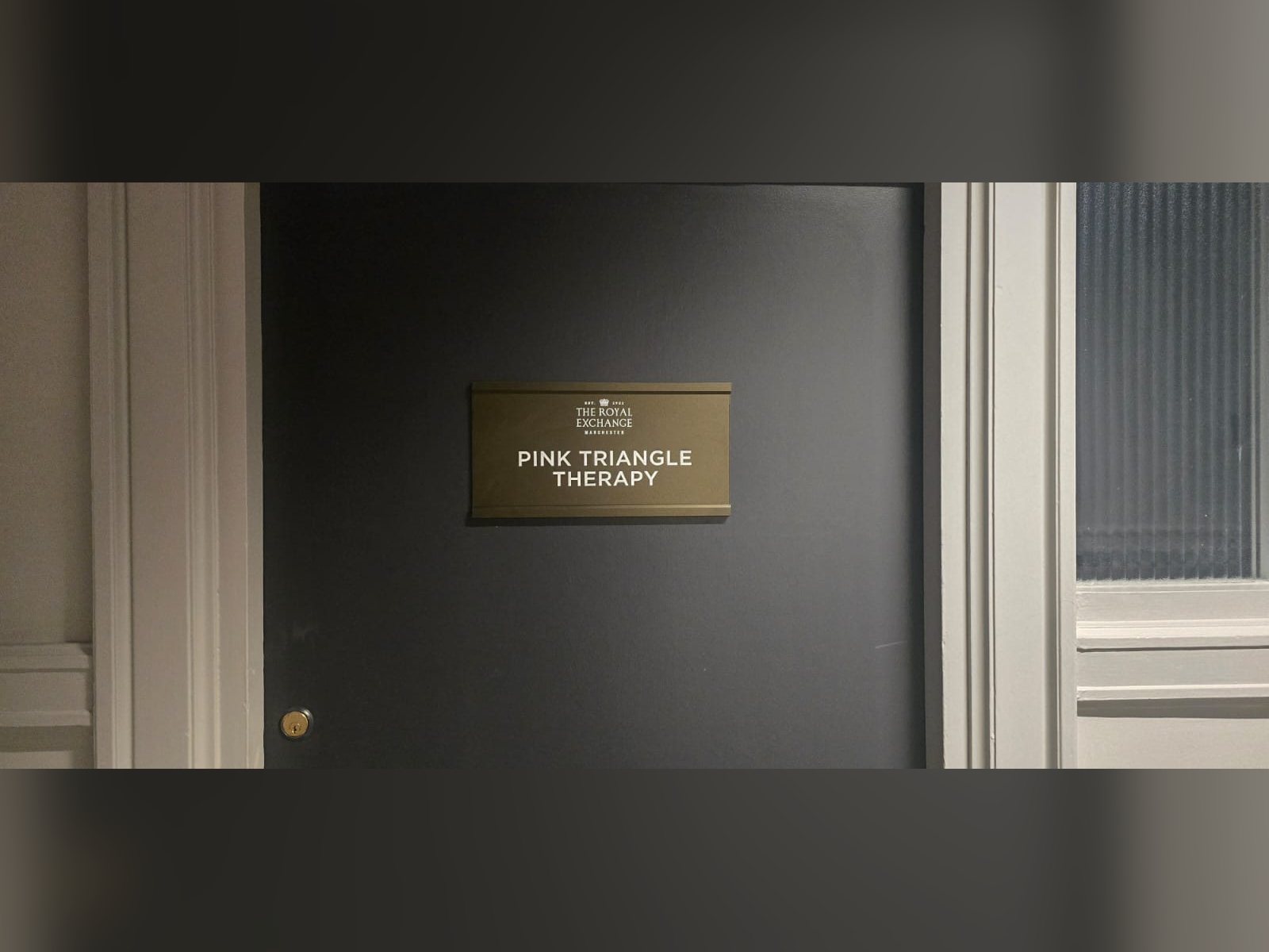 Tactile room identification sign on a therapy room door