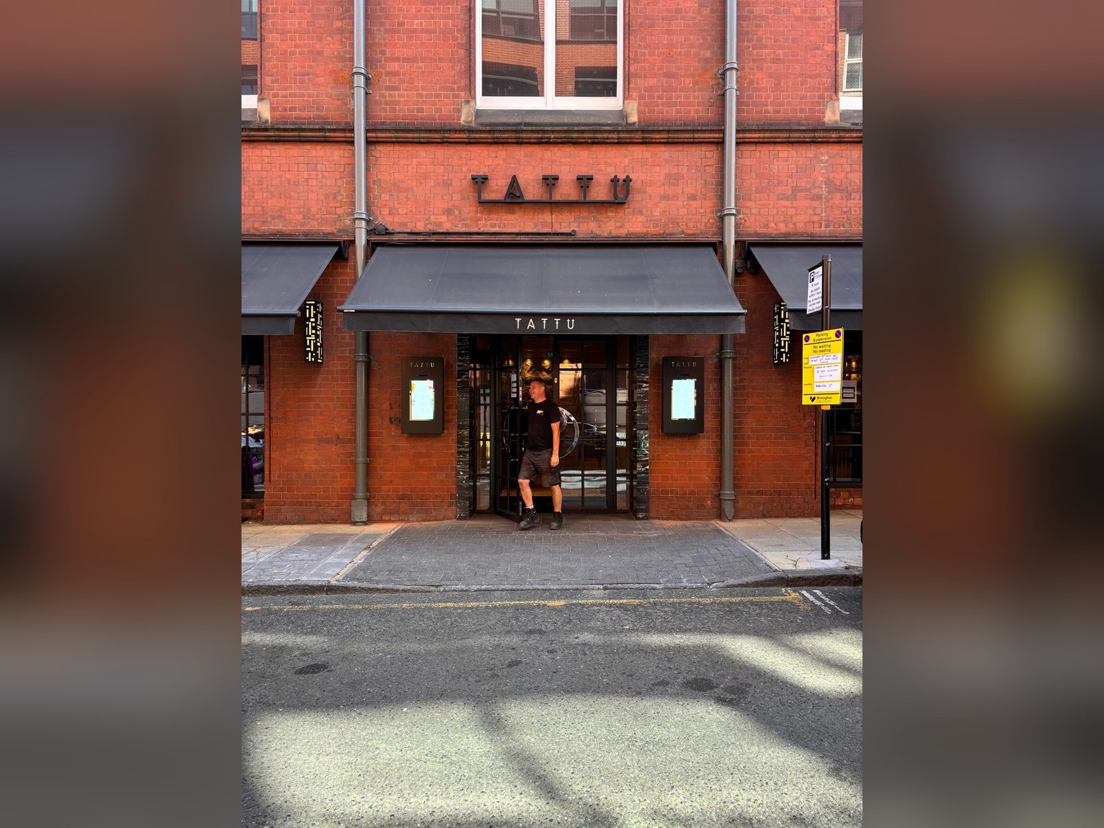 Restaurant frontage with a pair of outdoor digital menu screens