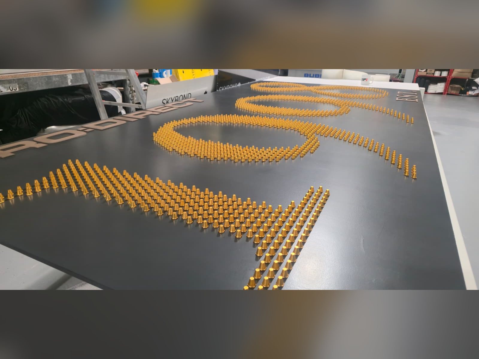 Tactile sign manufacture in the SPI workshop in Bolton, Greater Manchester