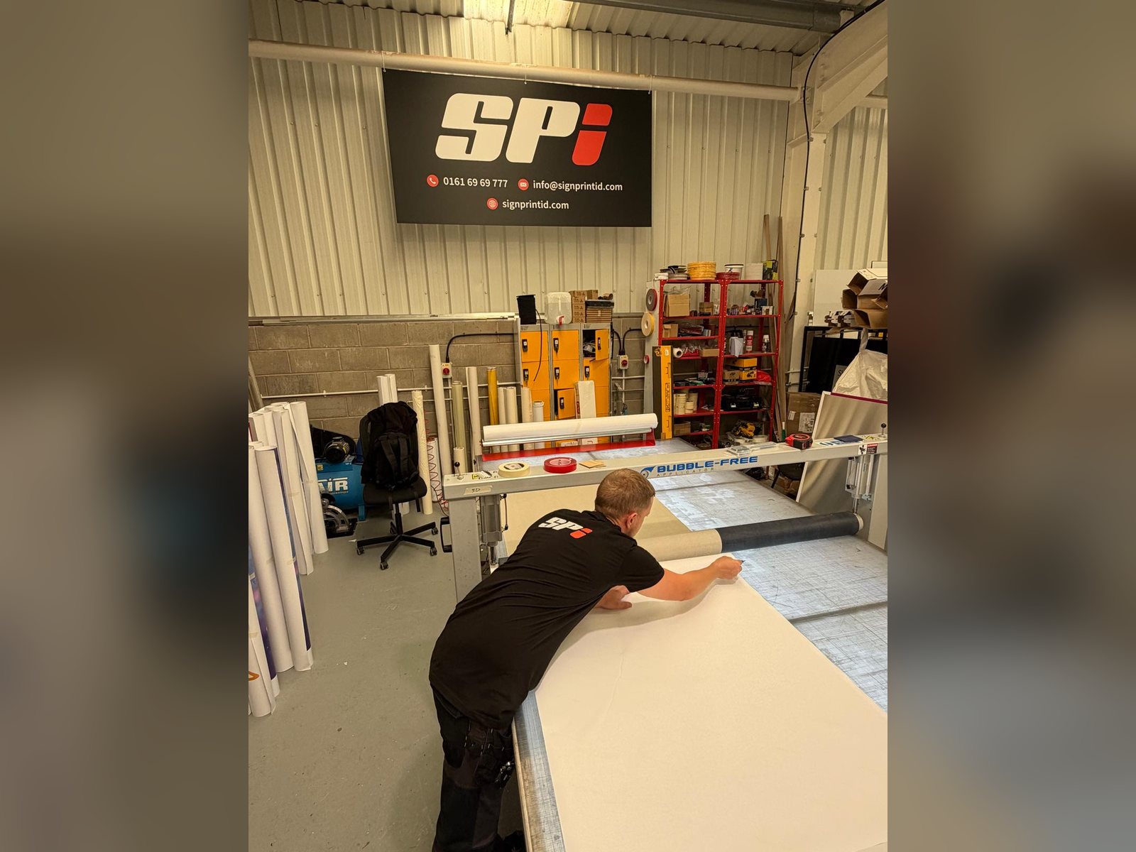 Applying printed graphics in the SPI workshop in Bolton