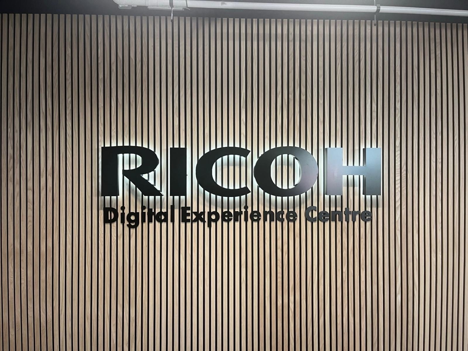 Dimensional lettering on a slatted timber feature wall