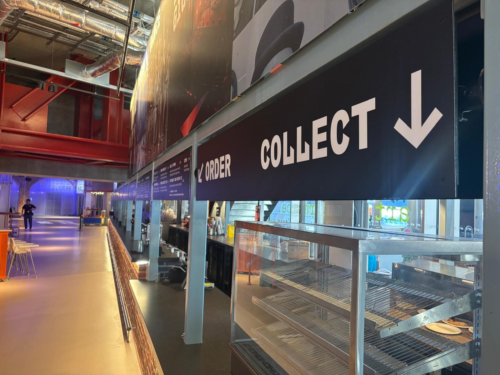 Order and collect signage in a food hall