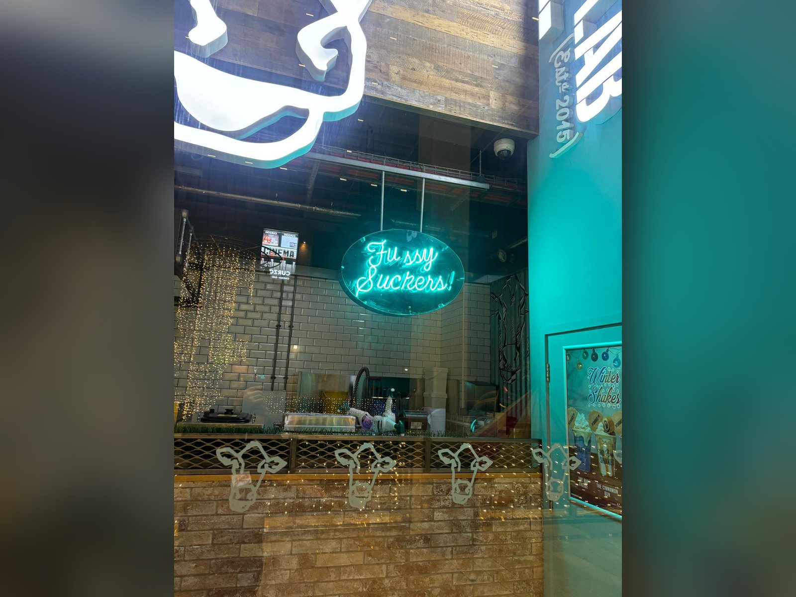 Bespoke neon sign in a Manchester bar fit out
