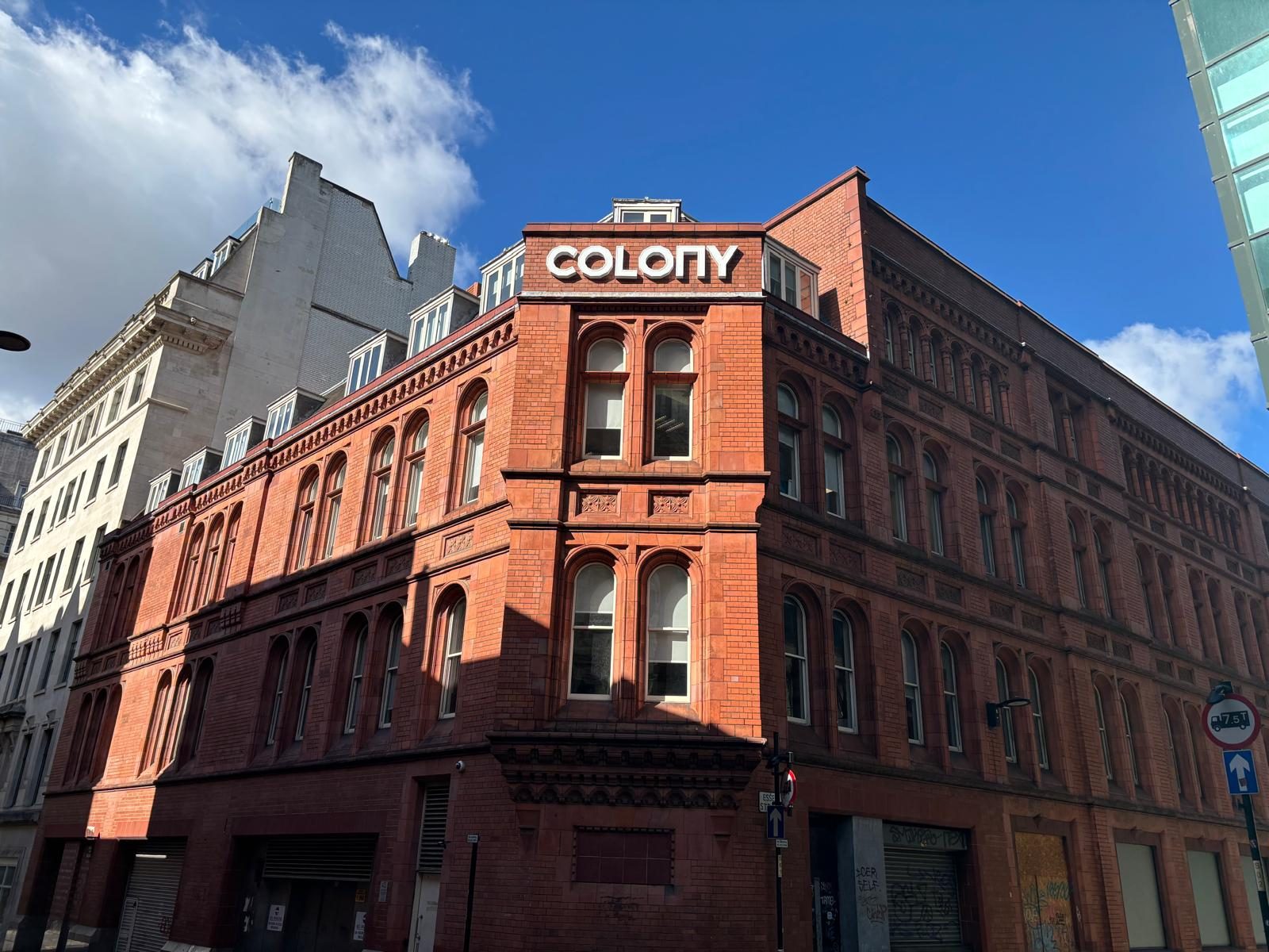 Built up letters on a red brick heritage building in Manchester