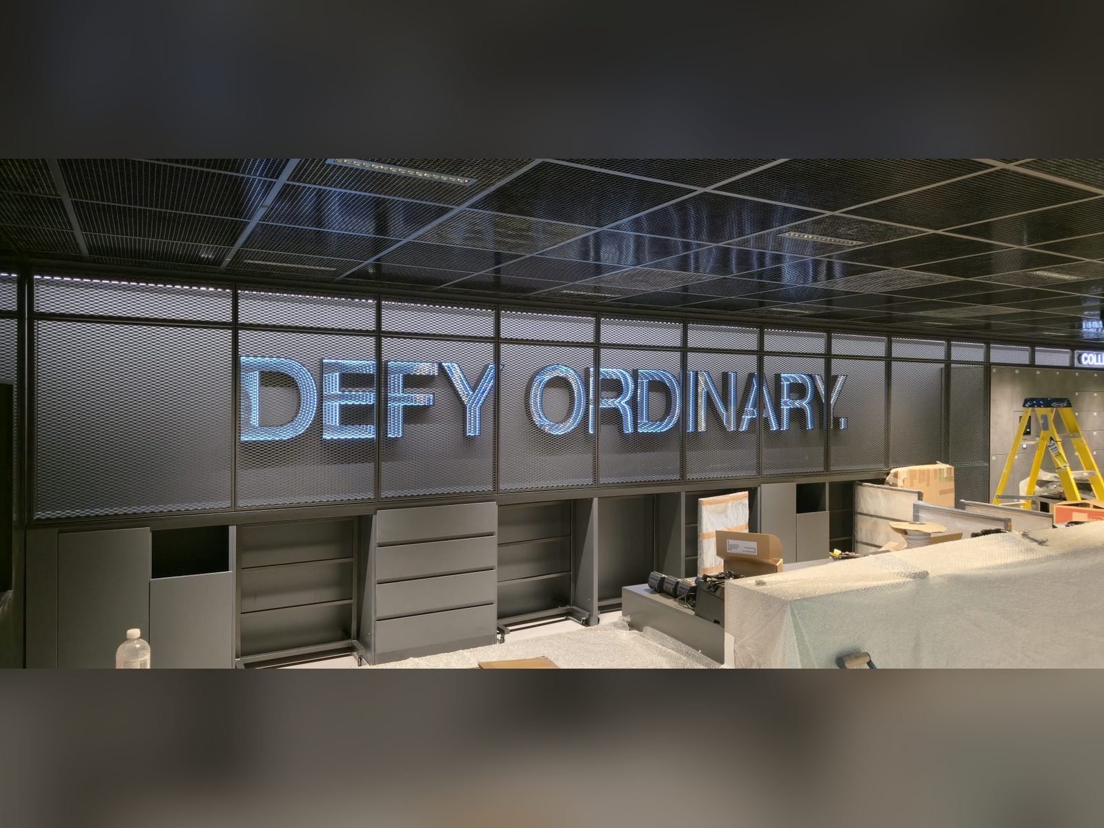 Metal built up letters on an interior feature wall