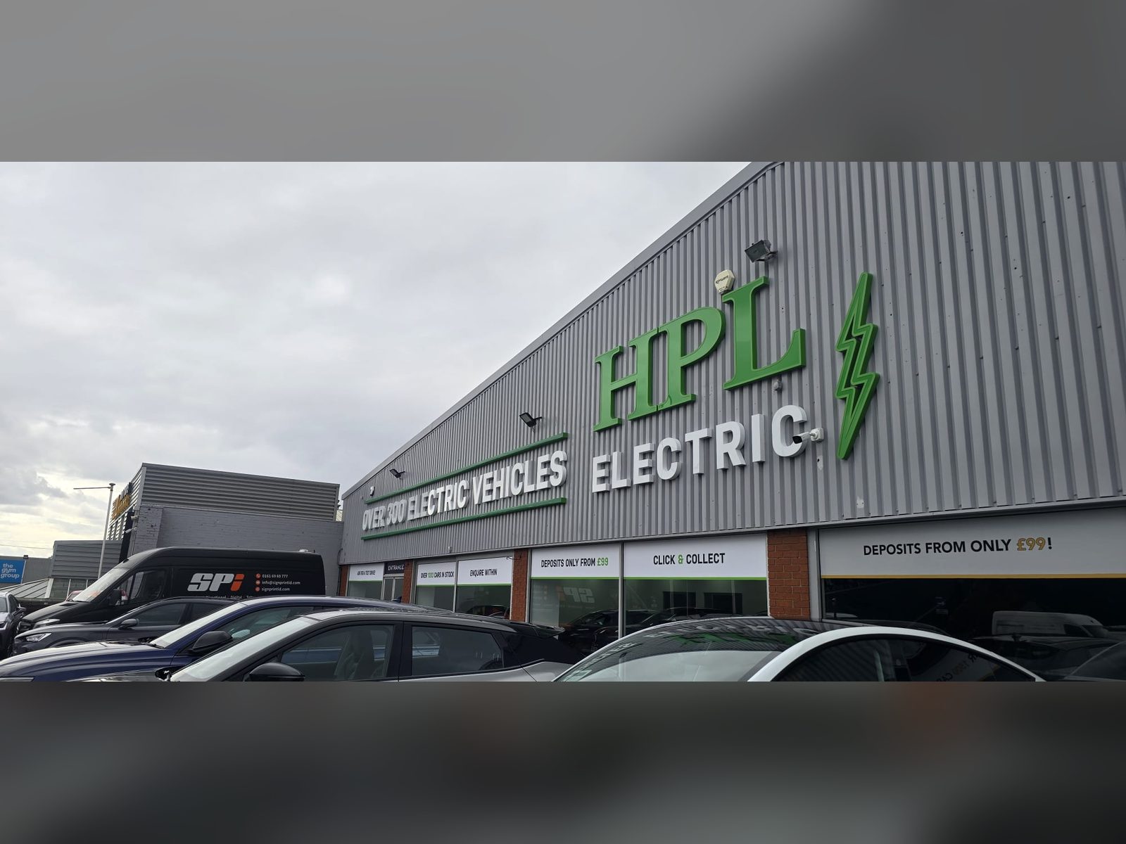 Coloured built up letters on a dealership elevation