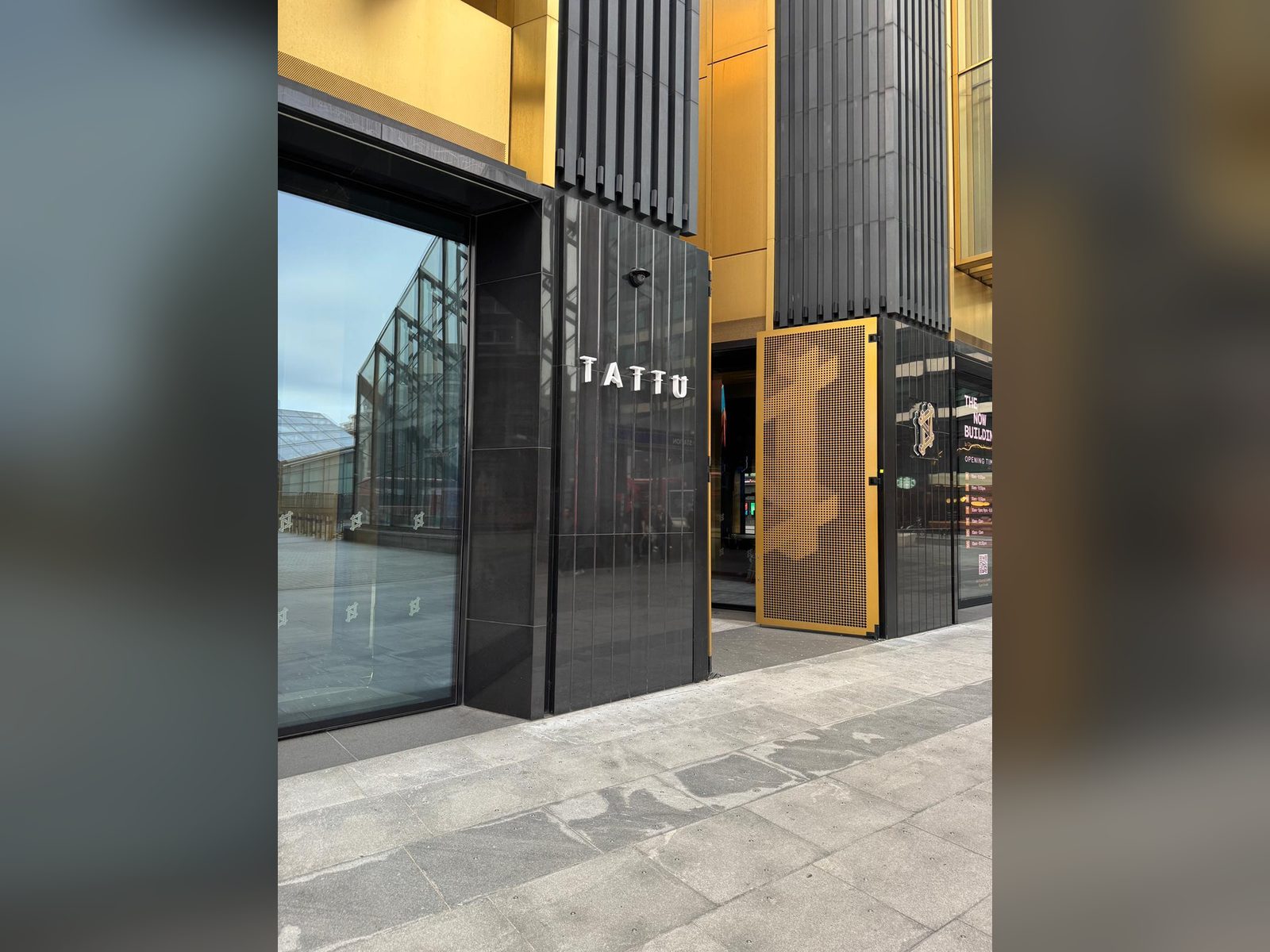 Vertical built up lettering on a restaurant entrance