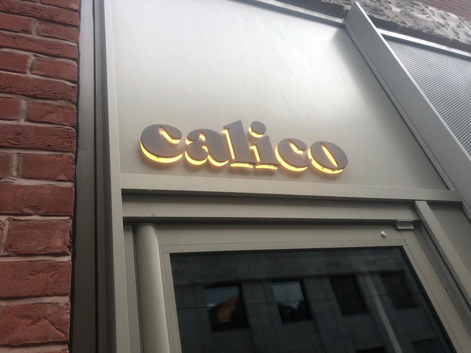 Halo illuminated built up letters on a building fascia