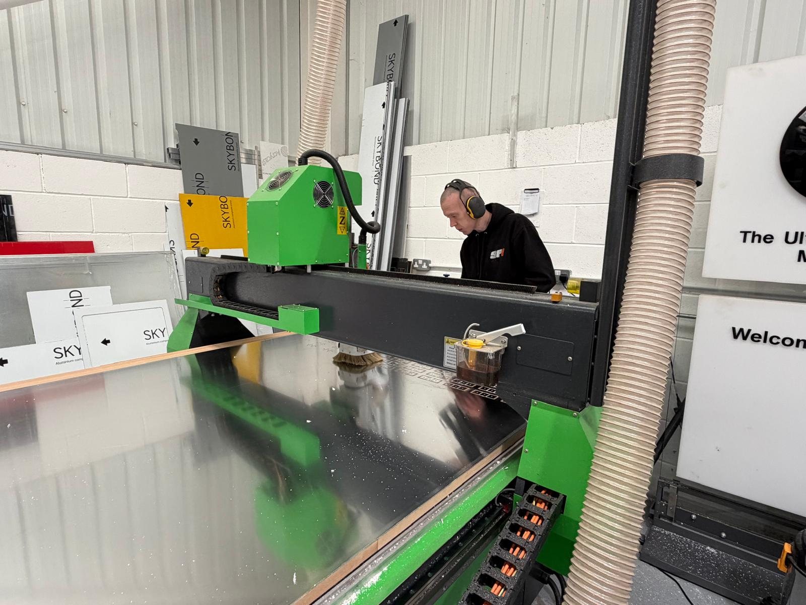 CNC router cutting sign panels in the SPI workshop
