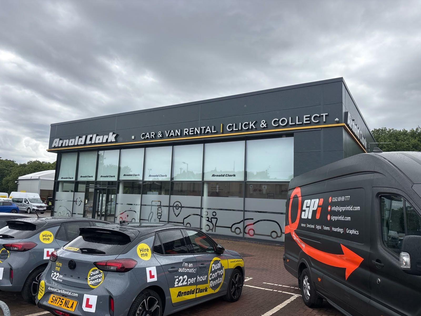 Fascia sign on a car and van rental branch
