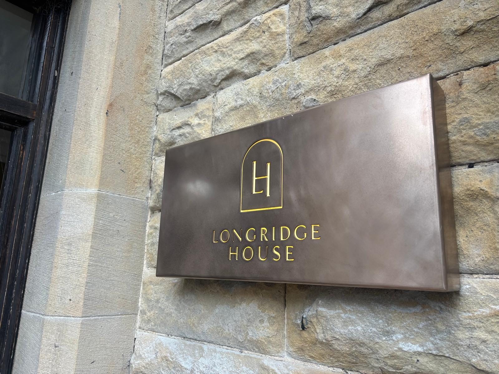 Bronze effect wall mounted name panel