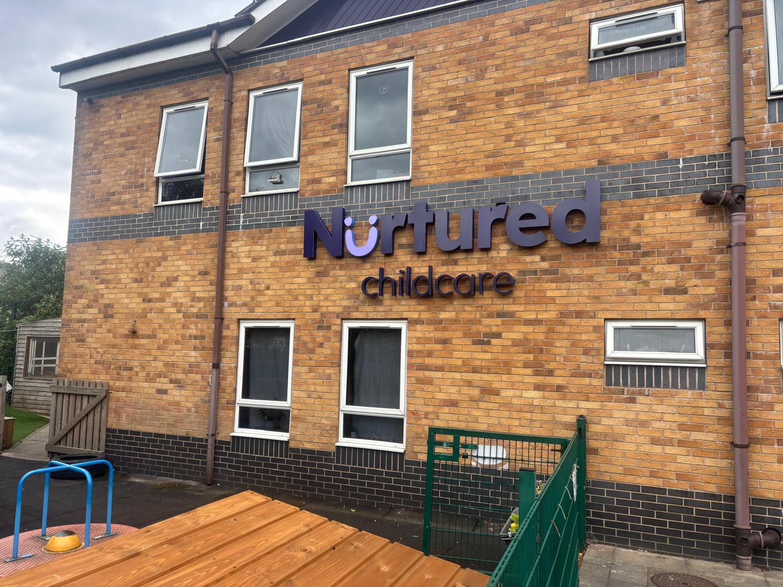 Built up lettering on a nursery building elevation