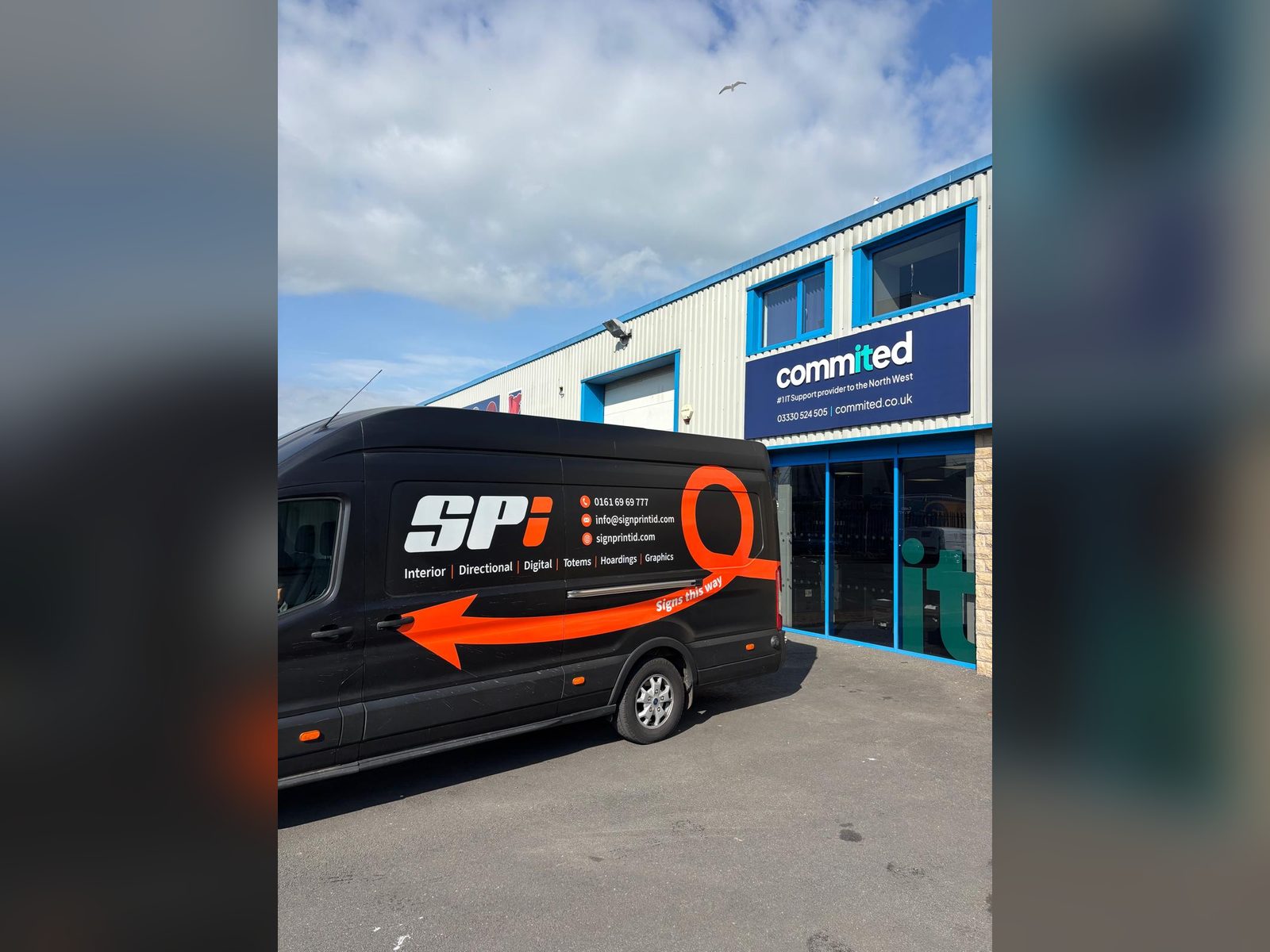 Office fascia sign with the SPI van outside