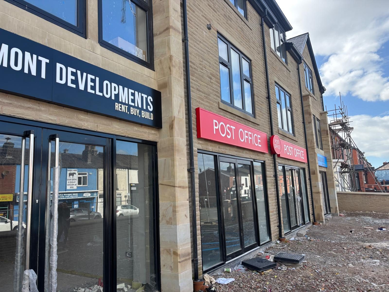 Fascia signs along a new retail parade