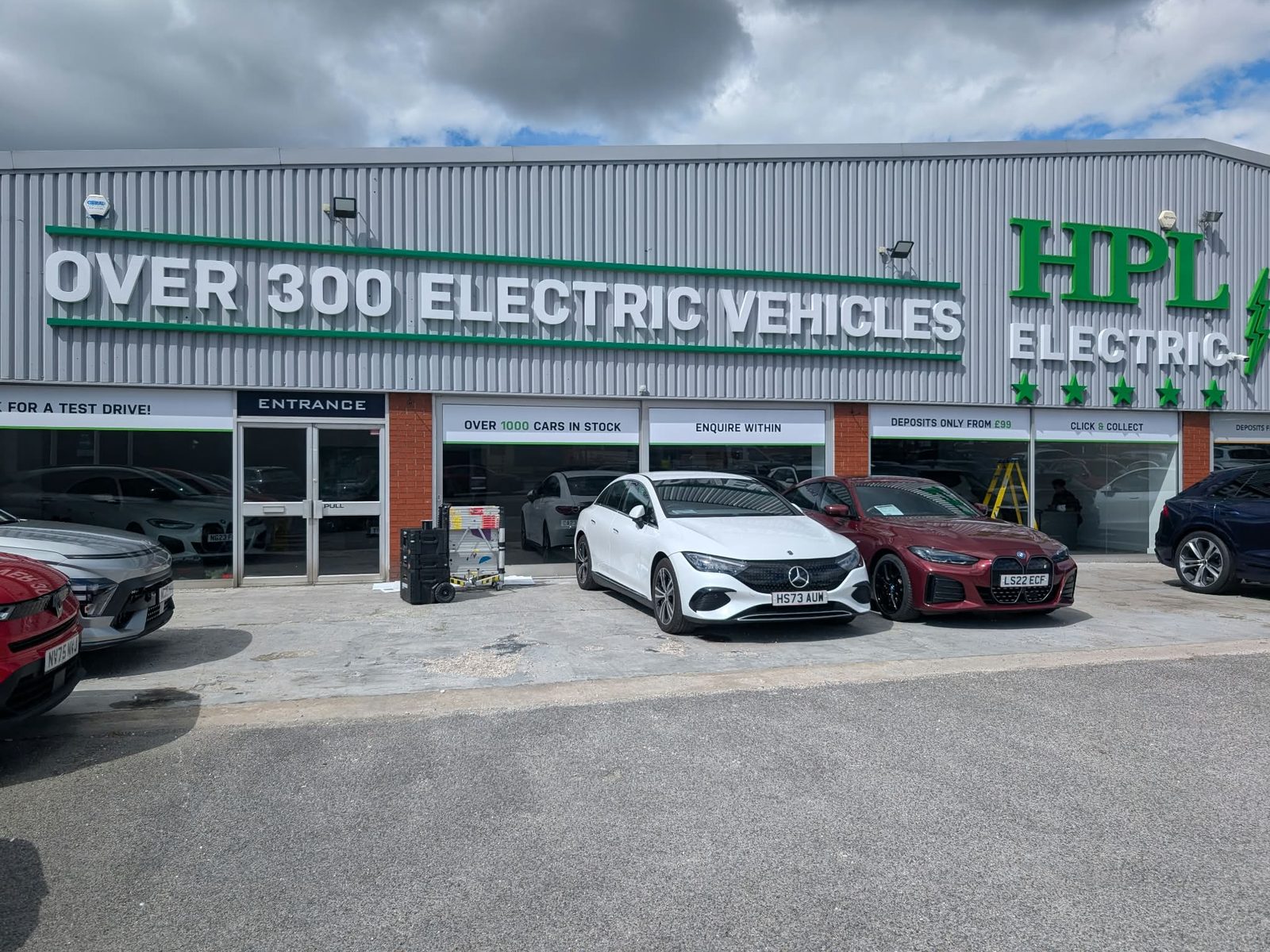 Large fascia lettering on an electric vehicle dealership