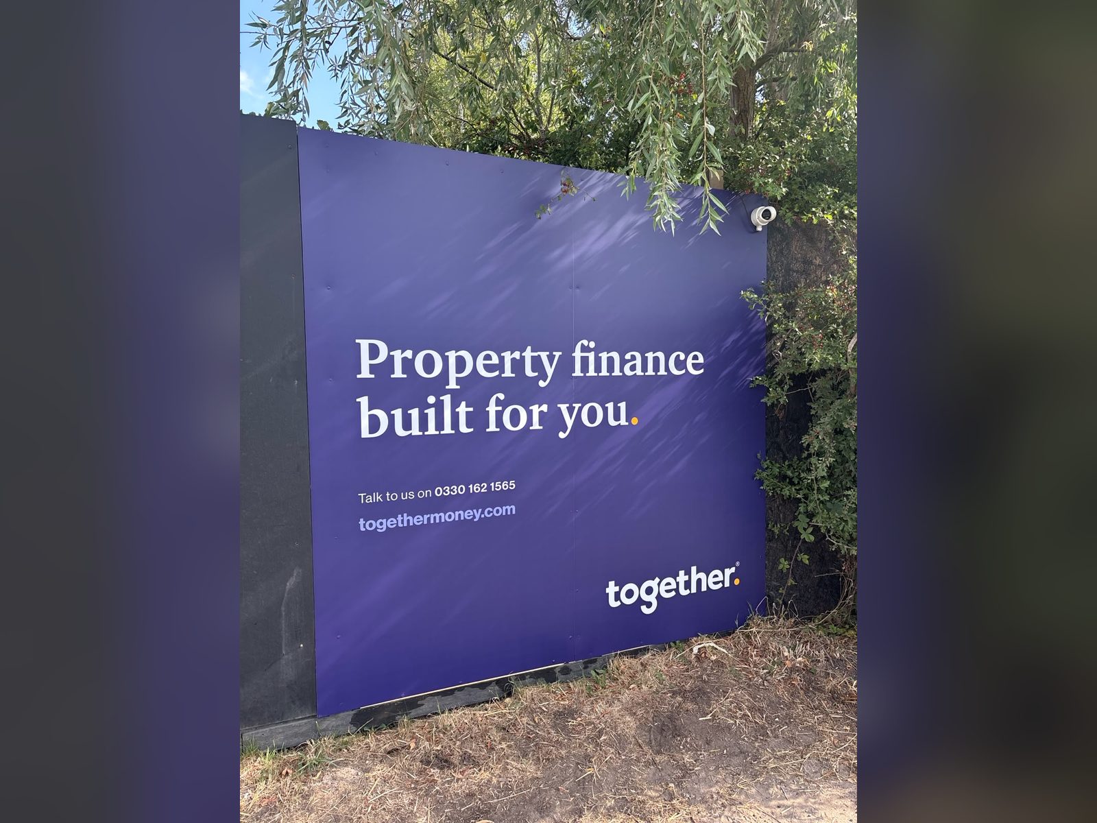 Printed hoarding panel for a property finance lender