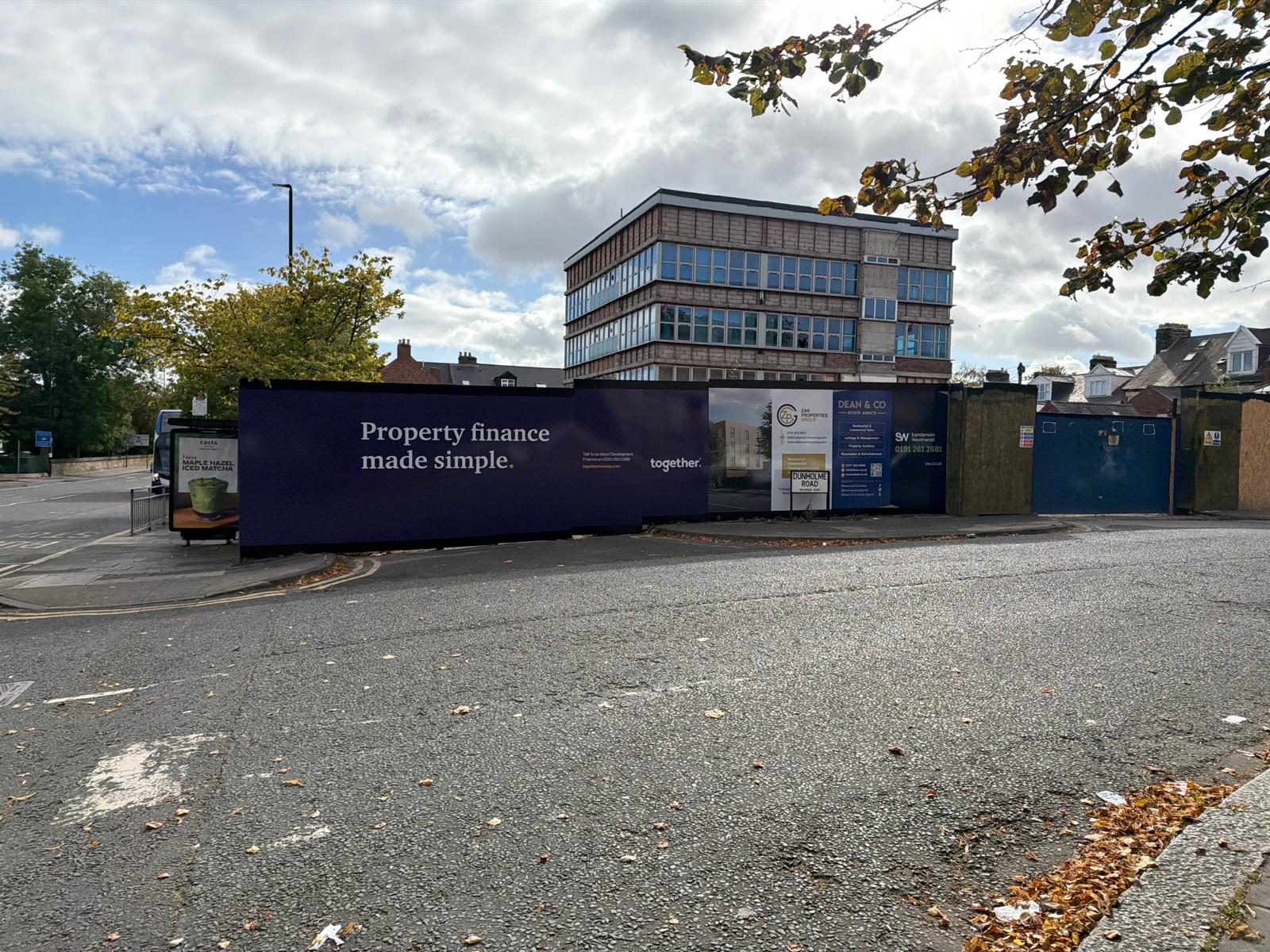 Printed hoarding on a corner development site