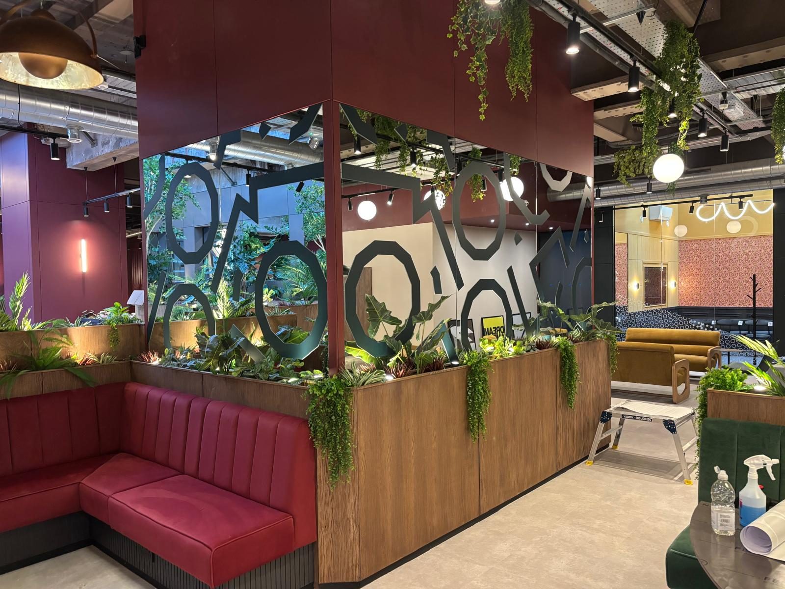 Decorative laser cut screen graphic in a workplace cafe