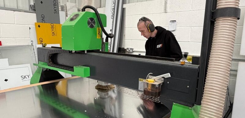 CNC router cutting sign panels in the SPI workshop, Bolton