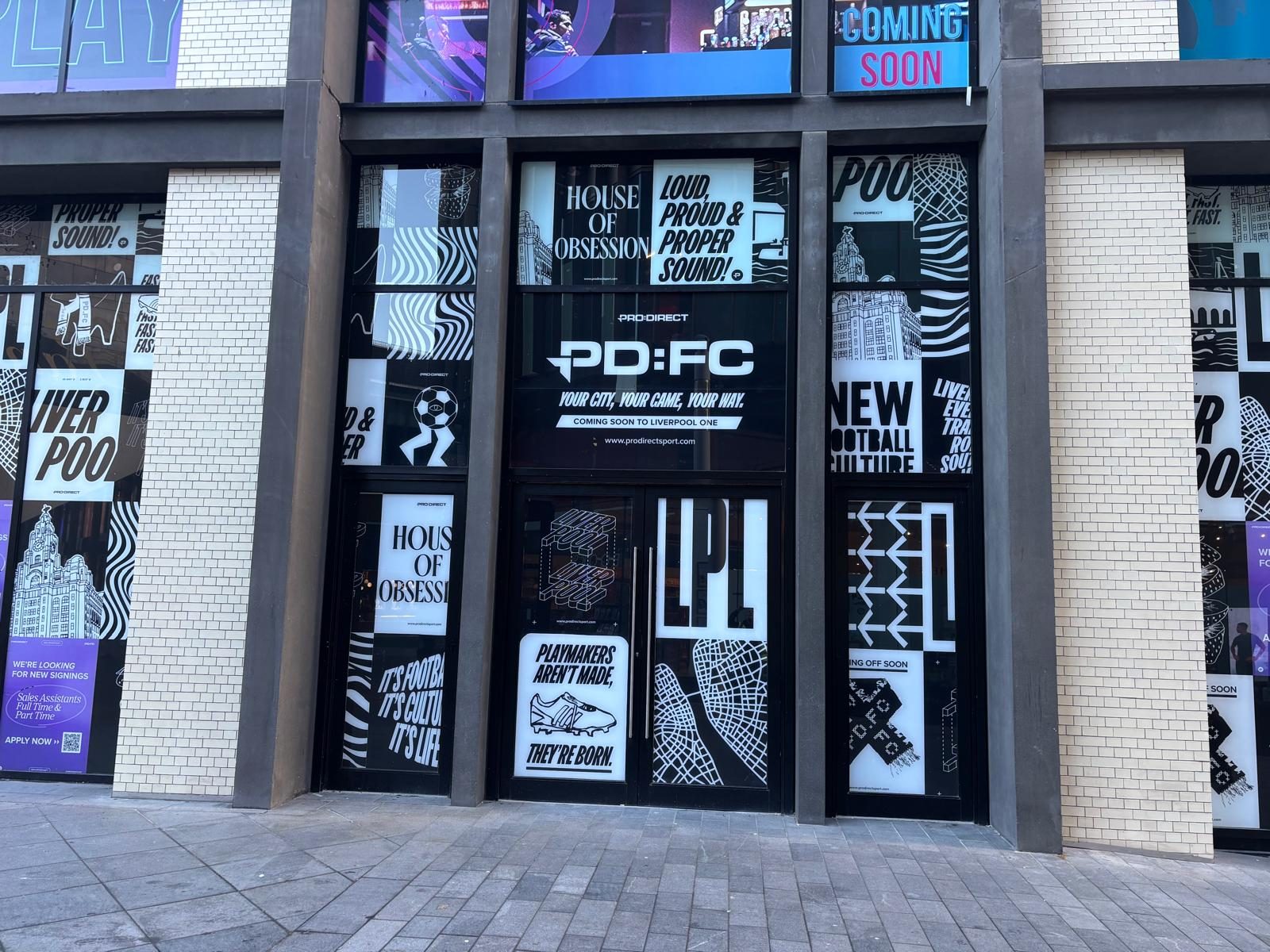 Printed window graphics across a retail shopfront