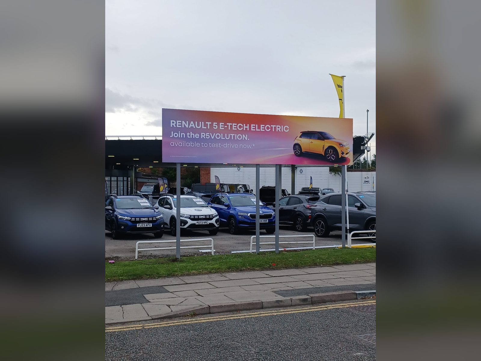 Roadside printed billboard for a car dealership