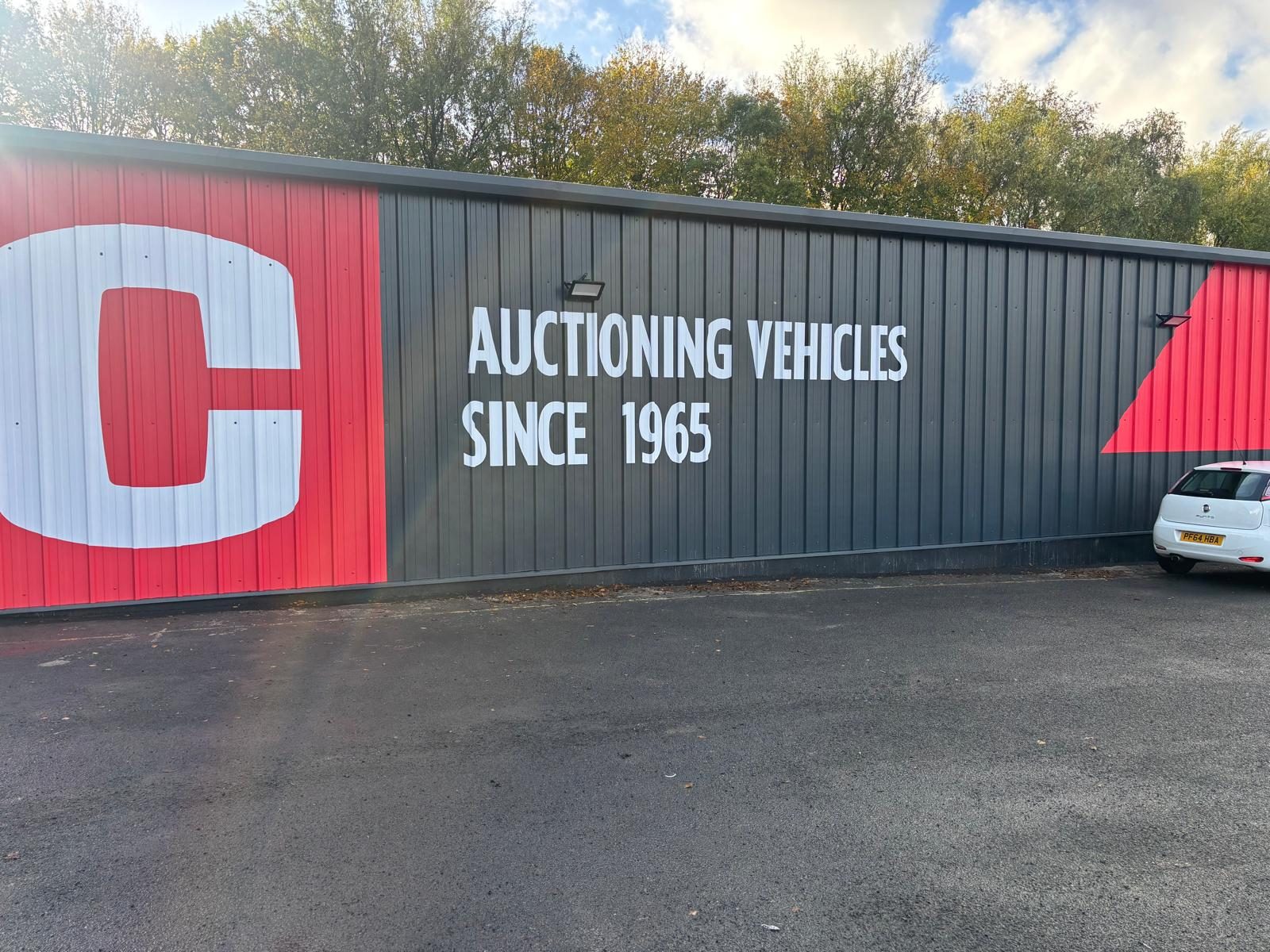 Large scale printed graphics on a building's cladding