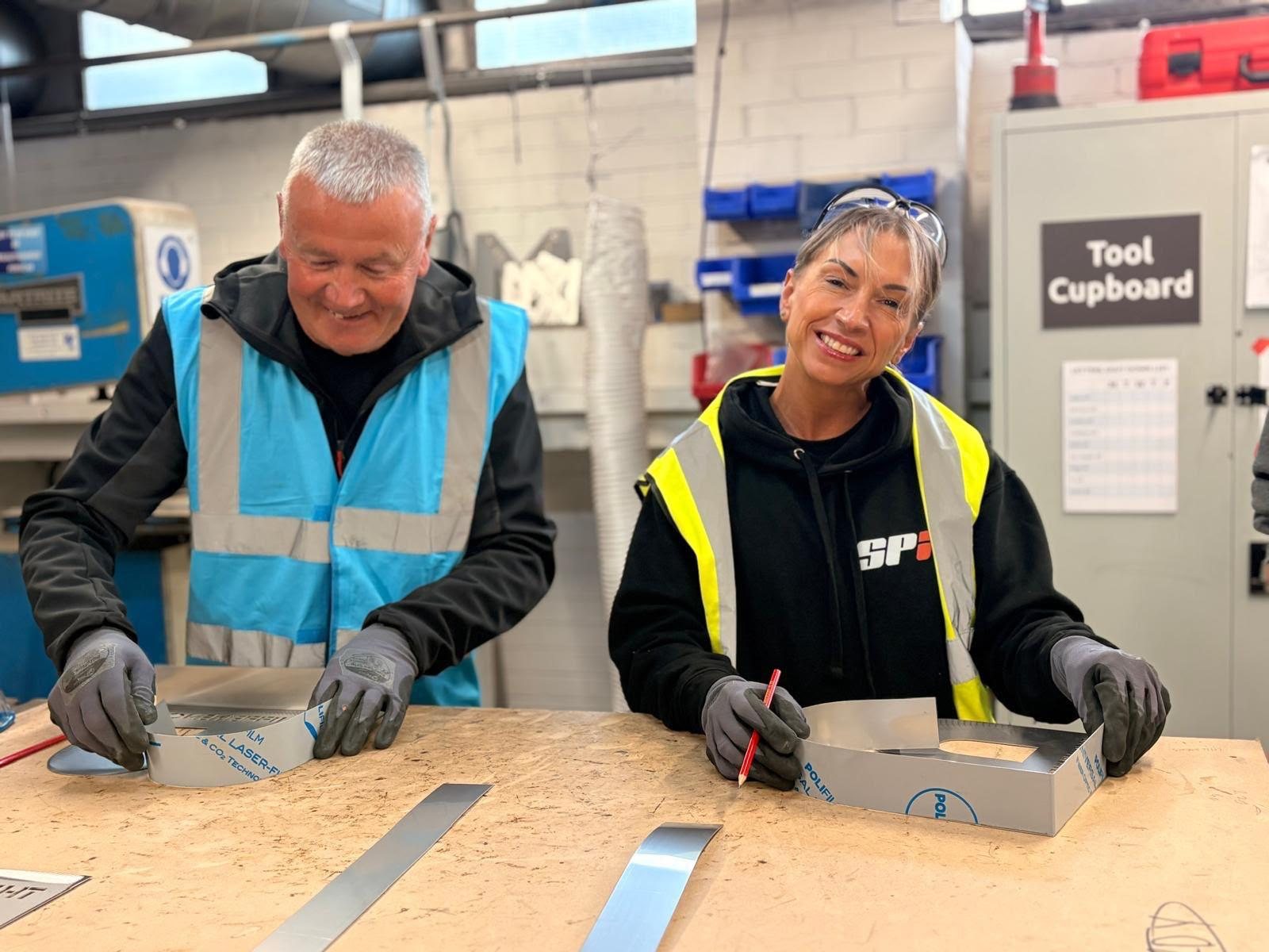 Sign tray fabrication and assembly in the SPI workshop