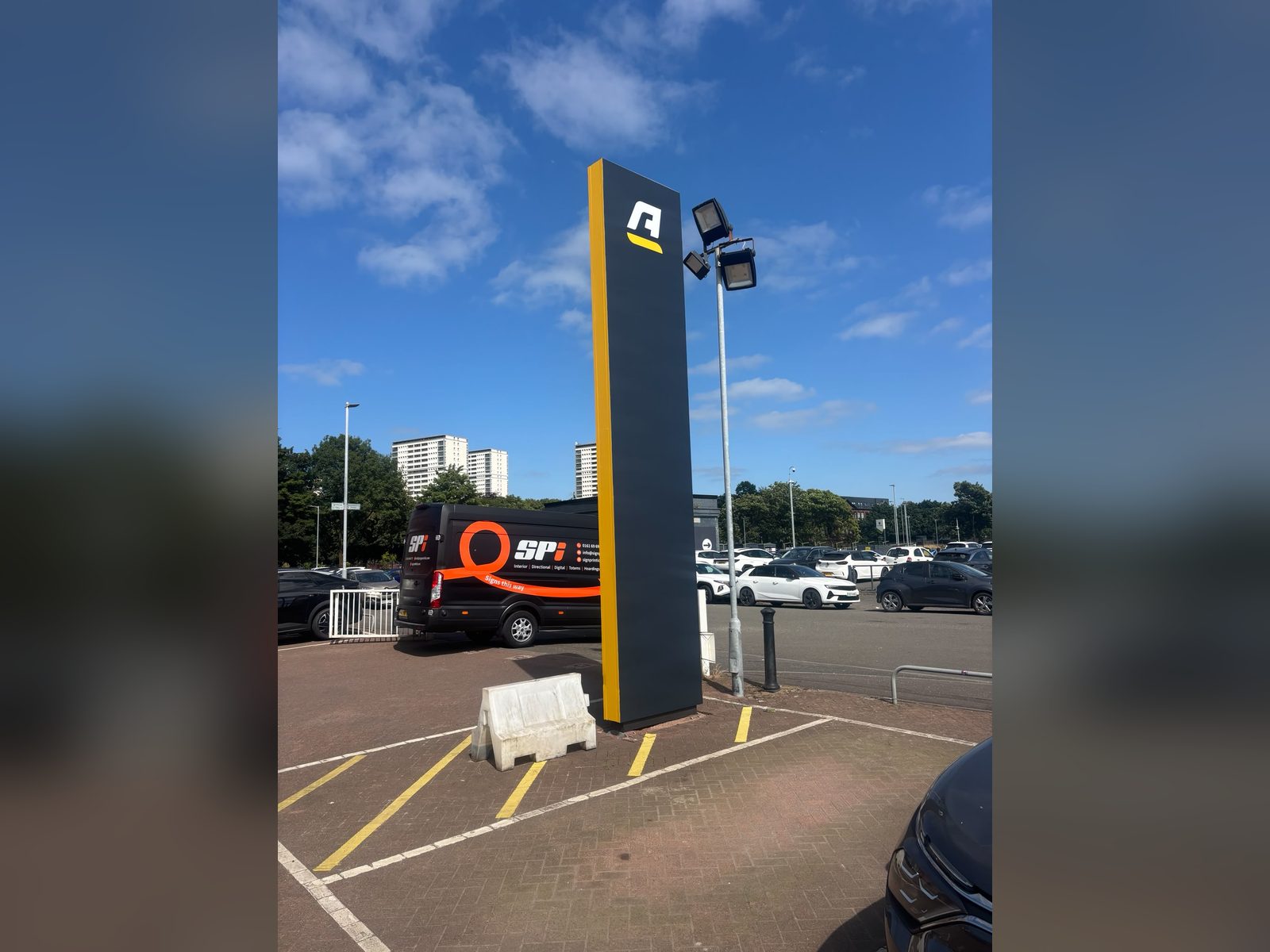 Pylon totem sign at a car dealership forecourt