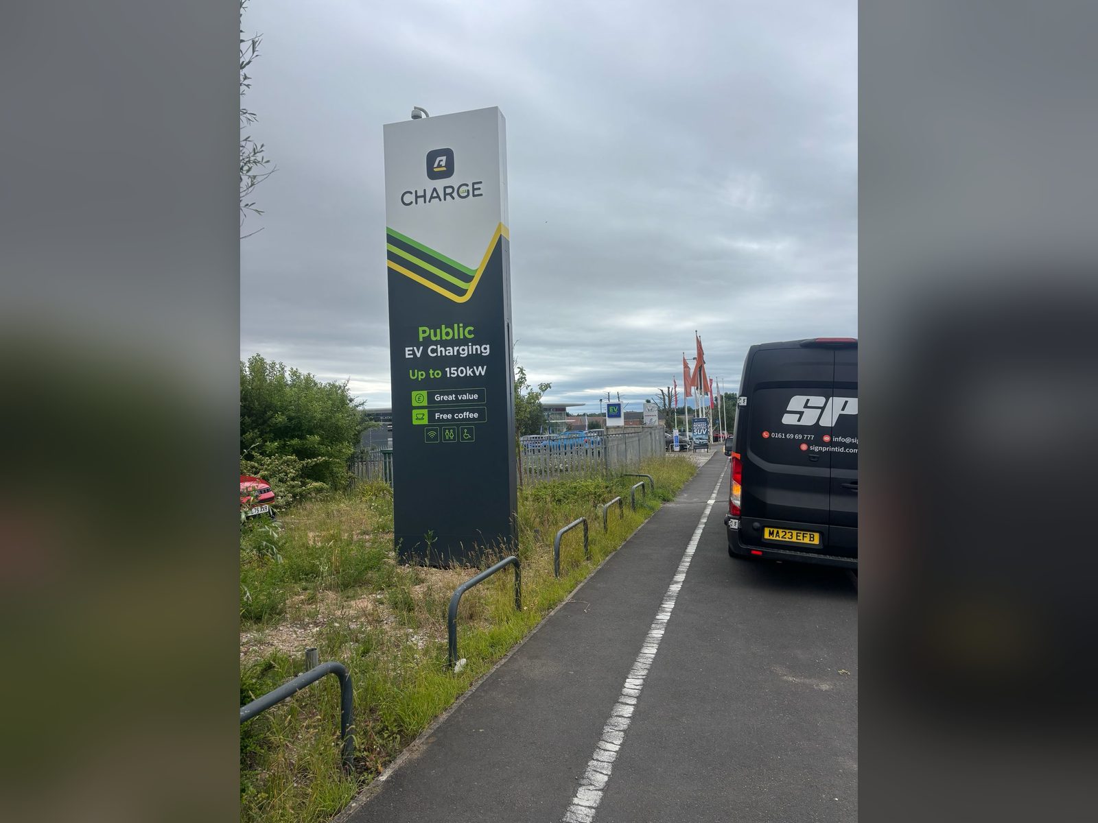 EV charging directory totem beside a road