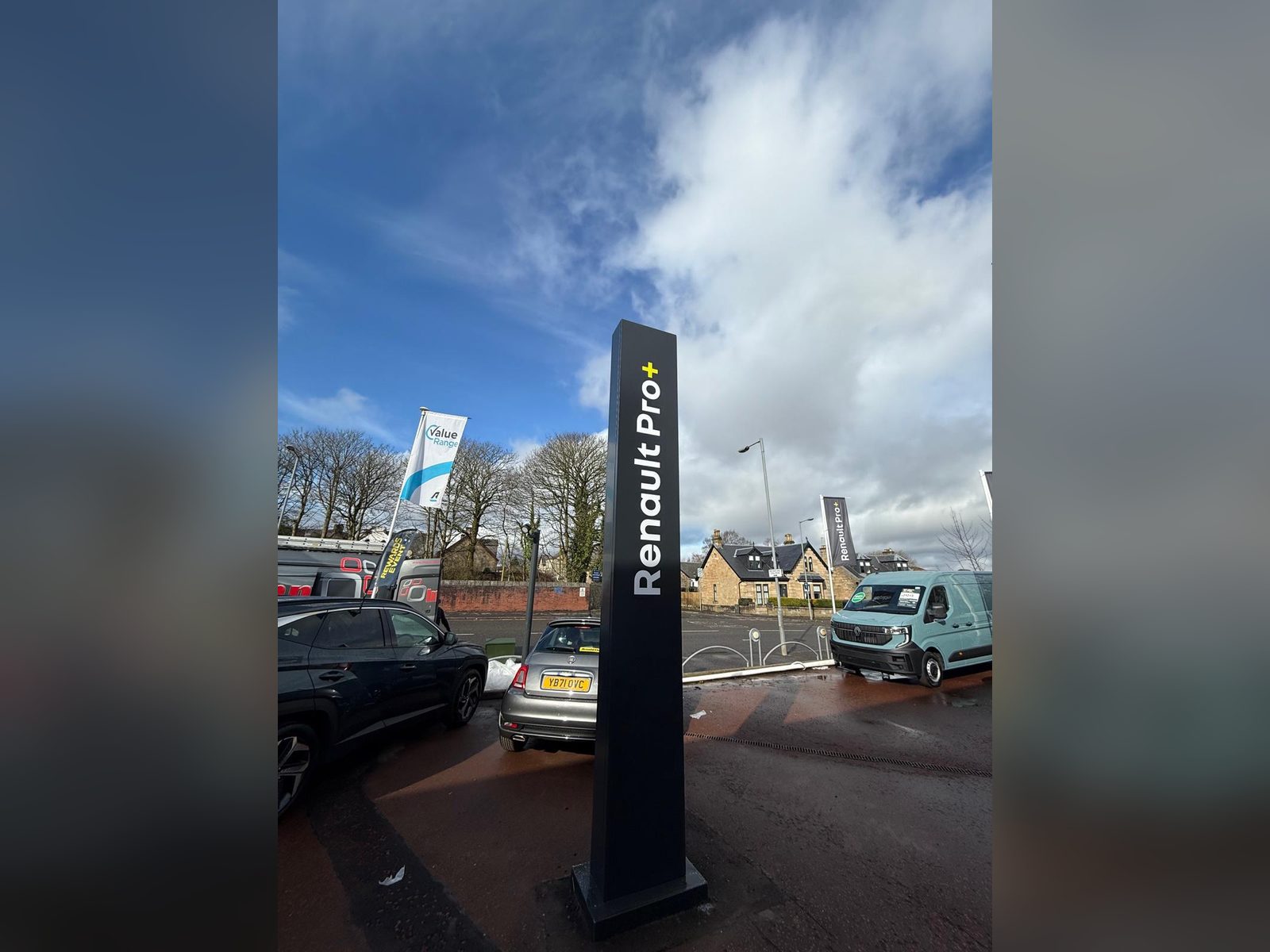 Slim totem sign for a van centre