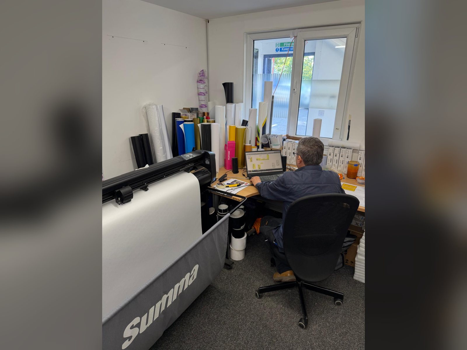Vinyl cutting and print station in the SPI workshop