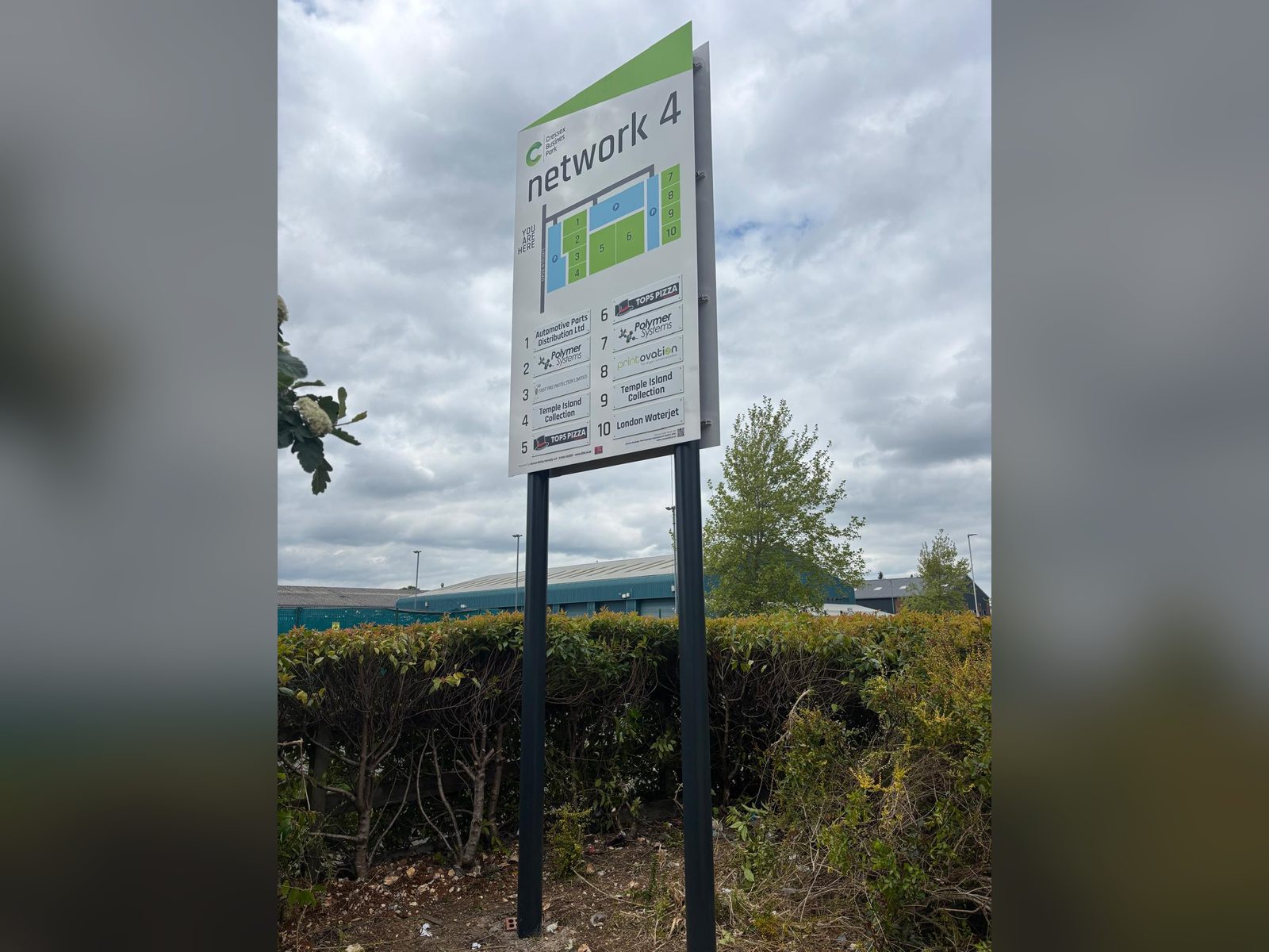 Map monolith with site plan and tenant directory at a business park