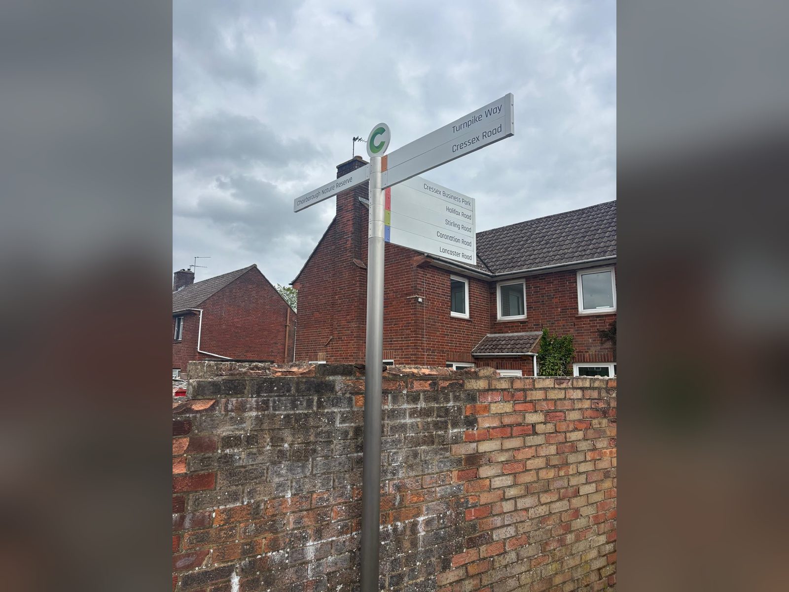 Fingerpost directional sign at a street junction