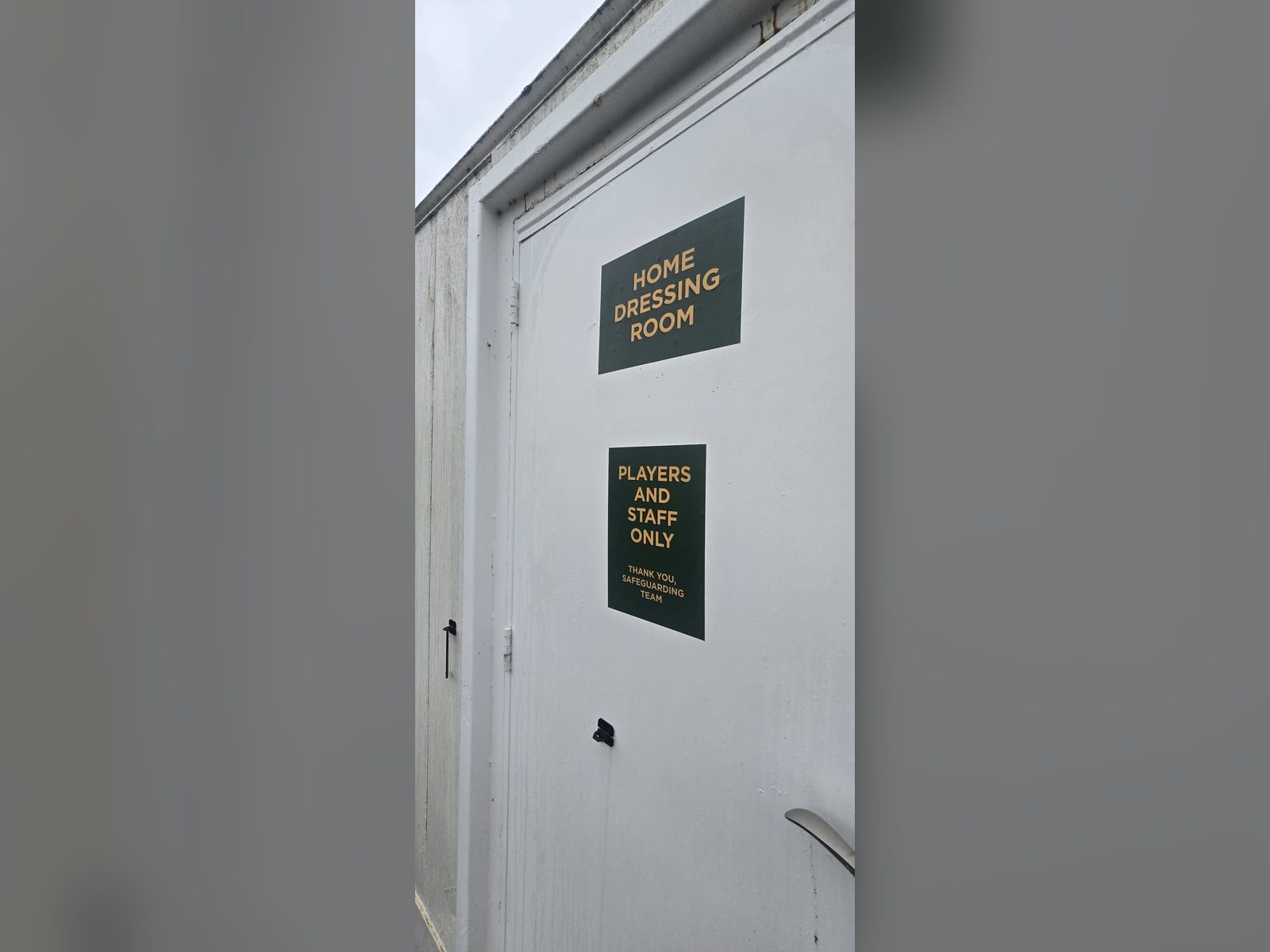 Room identification signs at a football stadium